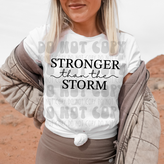 STRONGER THAN THE STORM - BLK - DTF TRANSFER